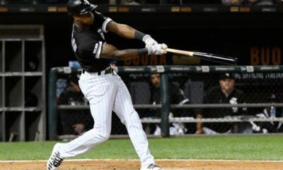 Tim Anderson swings during a home game for the Chicago White Sox.